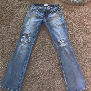 Distressed Buckle Boot cut jeans